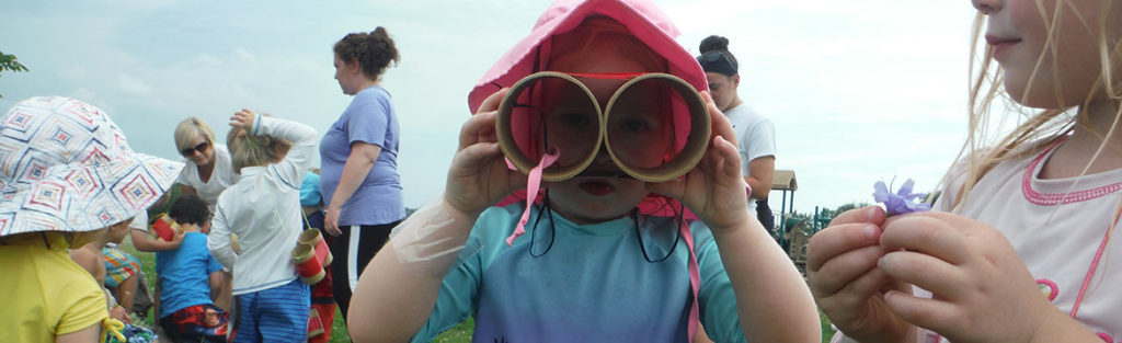 Girl with homemade binoculars